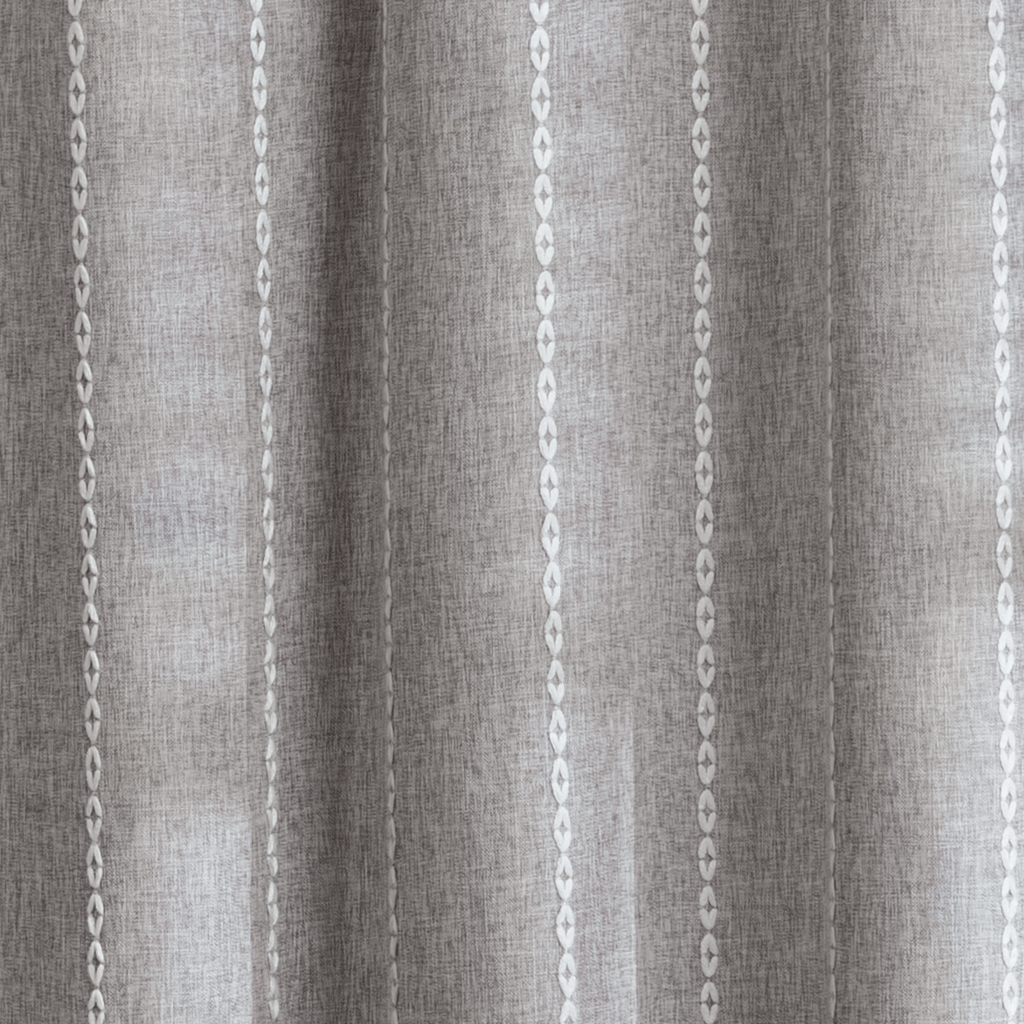 Weighted lower hem keeping the grey panel hanging evenly straight