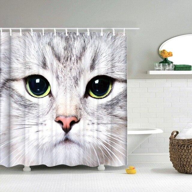 Grey and white tabby cat with green eyes photographed close up filling the panel