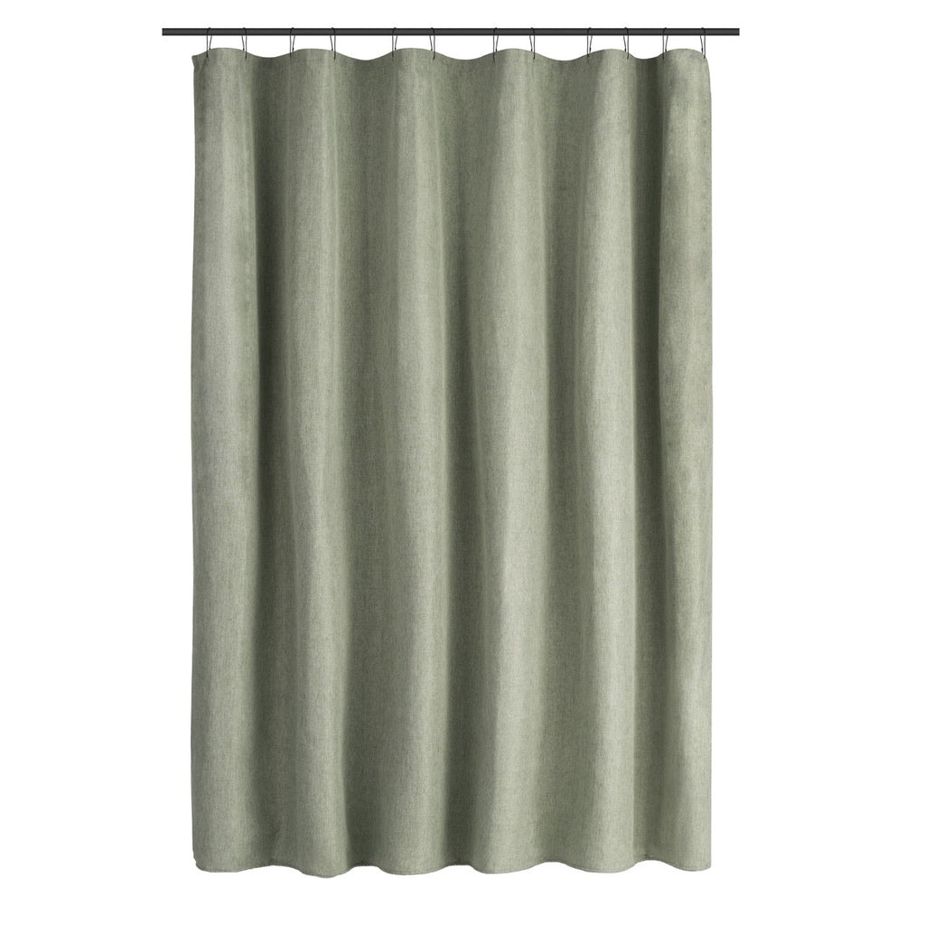 Sage linen curtain styled in a calm bathroom with natural light