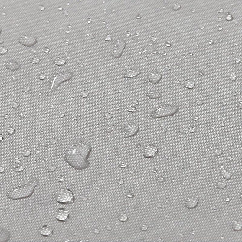 Close detail of the greige fabric surface and its fine even weave