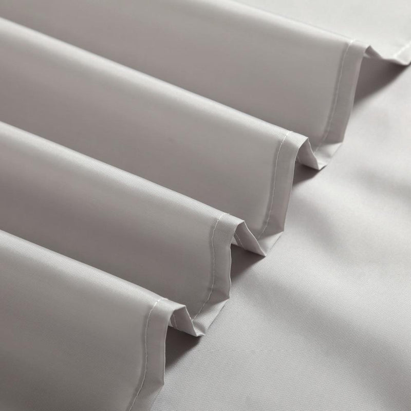 Upper hem of the greige panel with reinforced eyelets for shower hooks