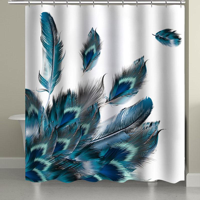 Spray of teal blue and slate grey feathers low on a white ground
