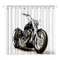 Black and chrome chopper motorcycle shown three quarters against white