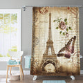 Eiffel Tower on a sepia postcard with handwriting, faded roses and a butterfly