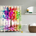 Painted tree with foliage of overlapping pink, violet, blue and green discs