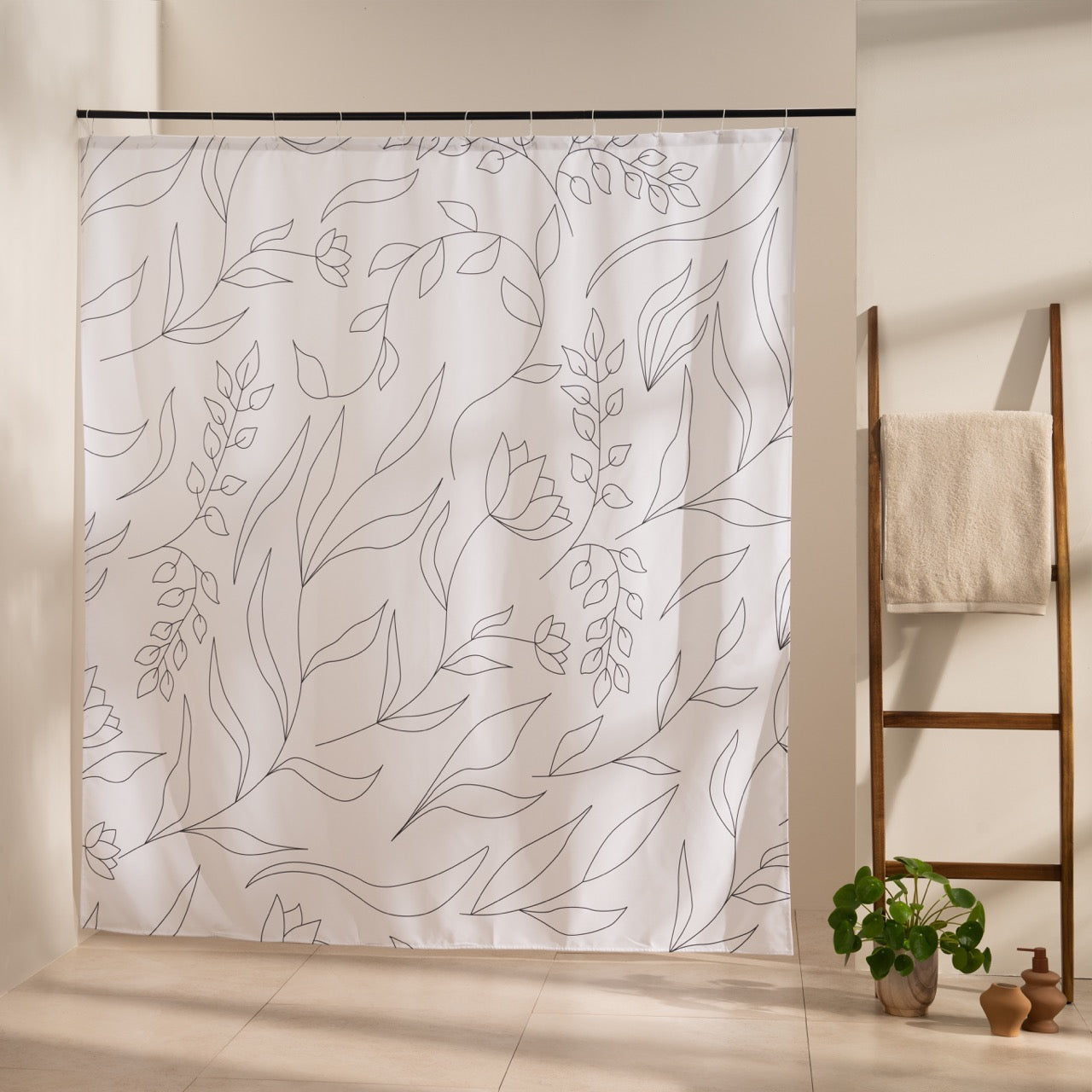 Fine beige and grey line foliage spread evenly over off-white cloth