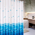 Pale blue droplets on white above a band of azure concentric ripples