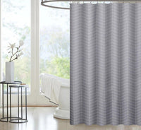 Tightly woven light grey and white chevrons falling in soft folds