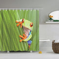 Large green leaf with pale veins and a green orange tree frog in front