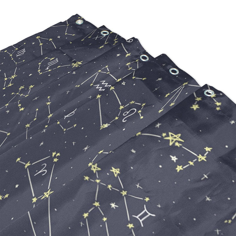 Close view of the five pointed gold stars on midnight blue fabric