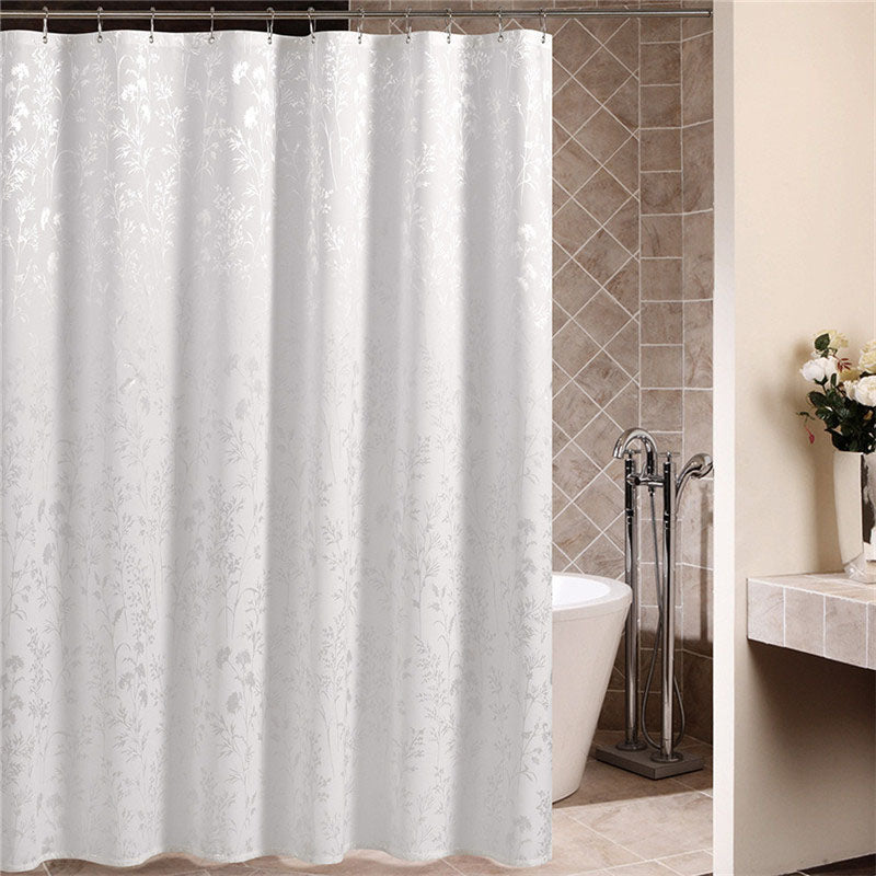 Solid white curtain with a floral design raised in satin woven relief
