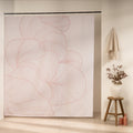 Faded pink line curves covering most of an off-white curtain panel