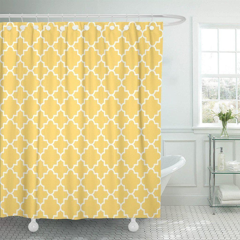 White quatrefoil trellis repeating evenly on a mustard yellow ground