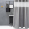 Mid grey panel with fine embossed texture cut by one white horizontal band