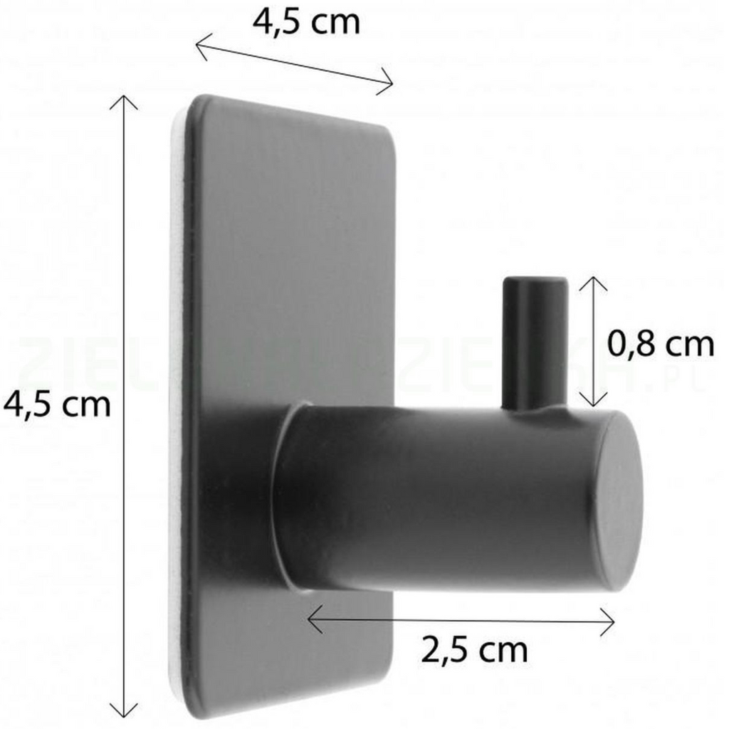 Black geometric hook holding a folded towel on the wall