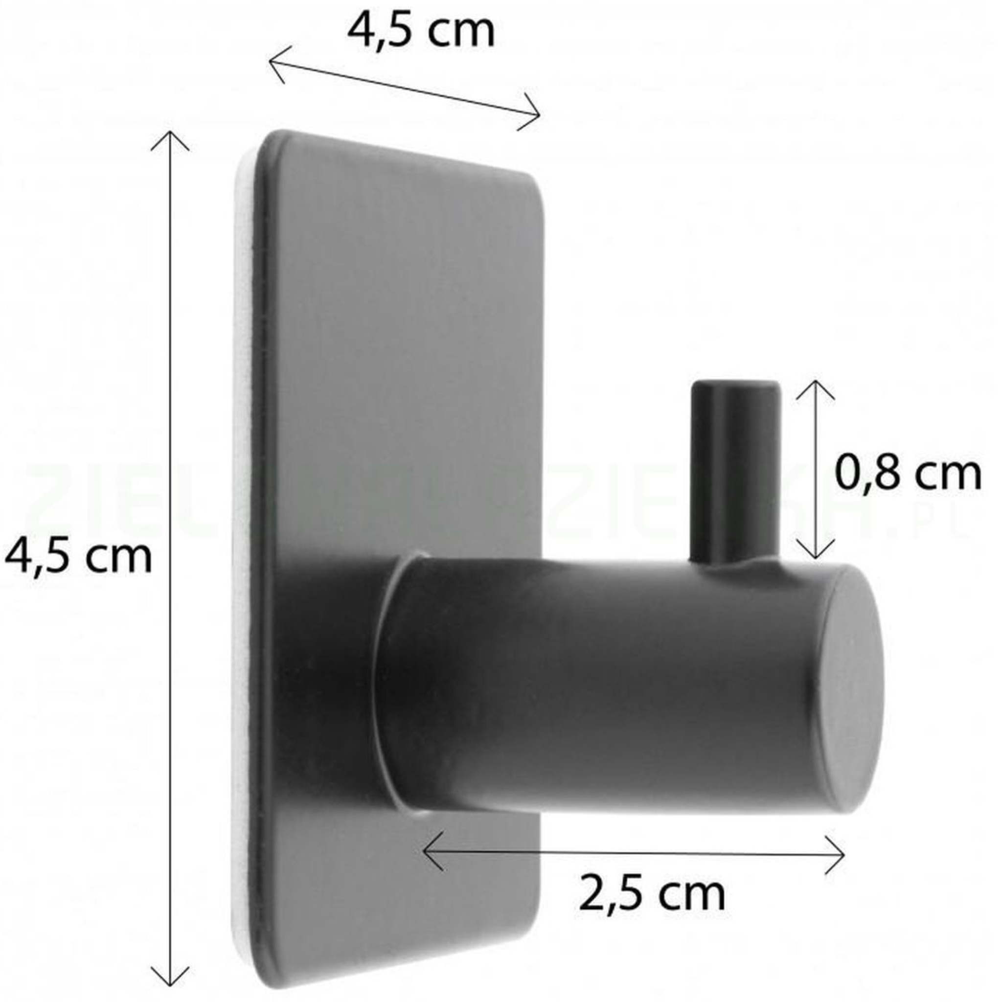 Black geometric hook holding a folded towel on the wall
