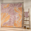 Large stylized pink and orange blooms overlapping across the panel