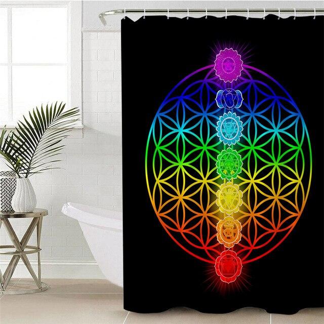 Rainbow flower of life rosette of interlaced circles on a plain black ground