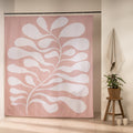 Large stylized branch of rounded white leaves on powder pink
