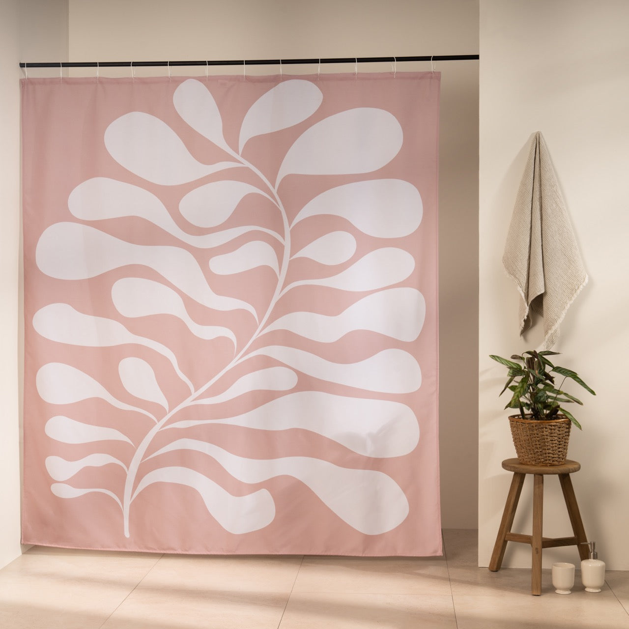 Large stylized branch of rounded white leaves on powder pink