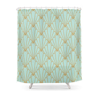 Gold line art deco fans staggered across a pale aqua curtain ground