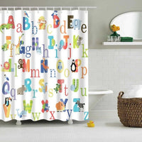 Alphabet in coloured letters with a different animal beside each on white