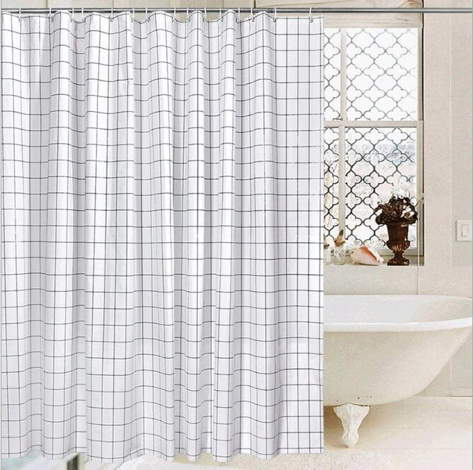 Fine black grid printed over a translucent white curtain panel