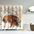 Adult tiger and cub standing in snow beneath frosted branches in winter light