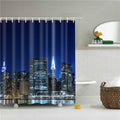 Deep navy sky above a lit city skyline reflected in dark water