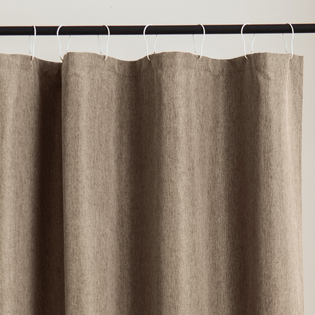 Close detail of the greige weave showing its natural linen texture