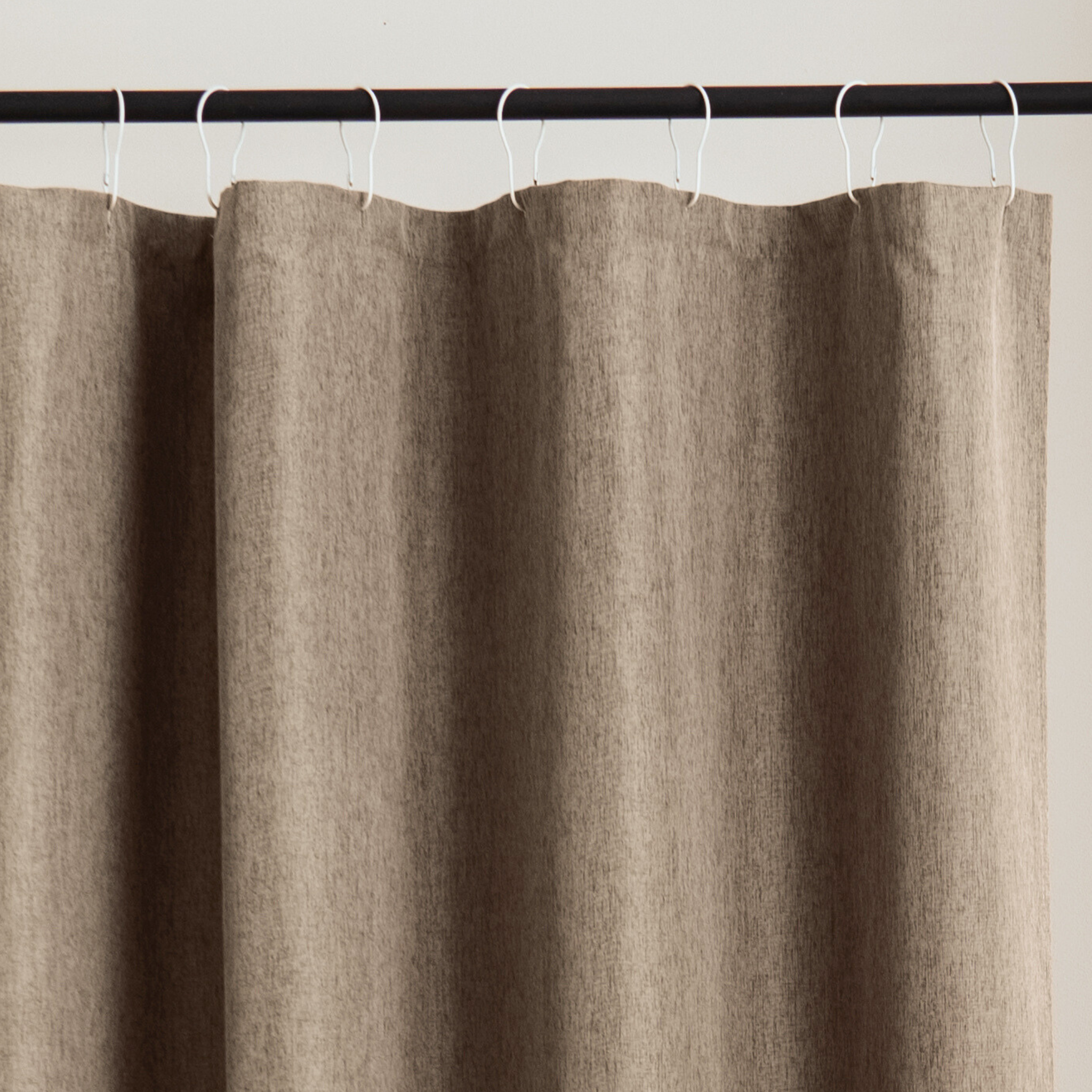 Close detail of the greige weave showing its natural linen texture