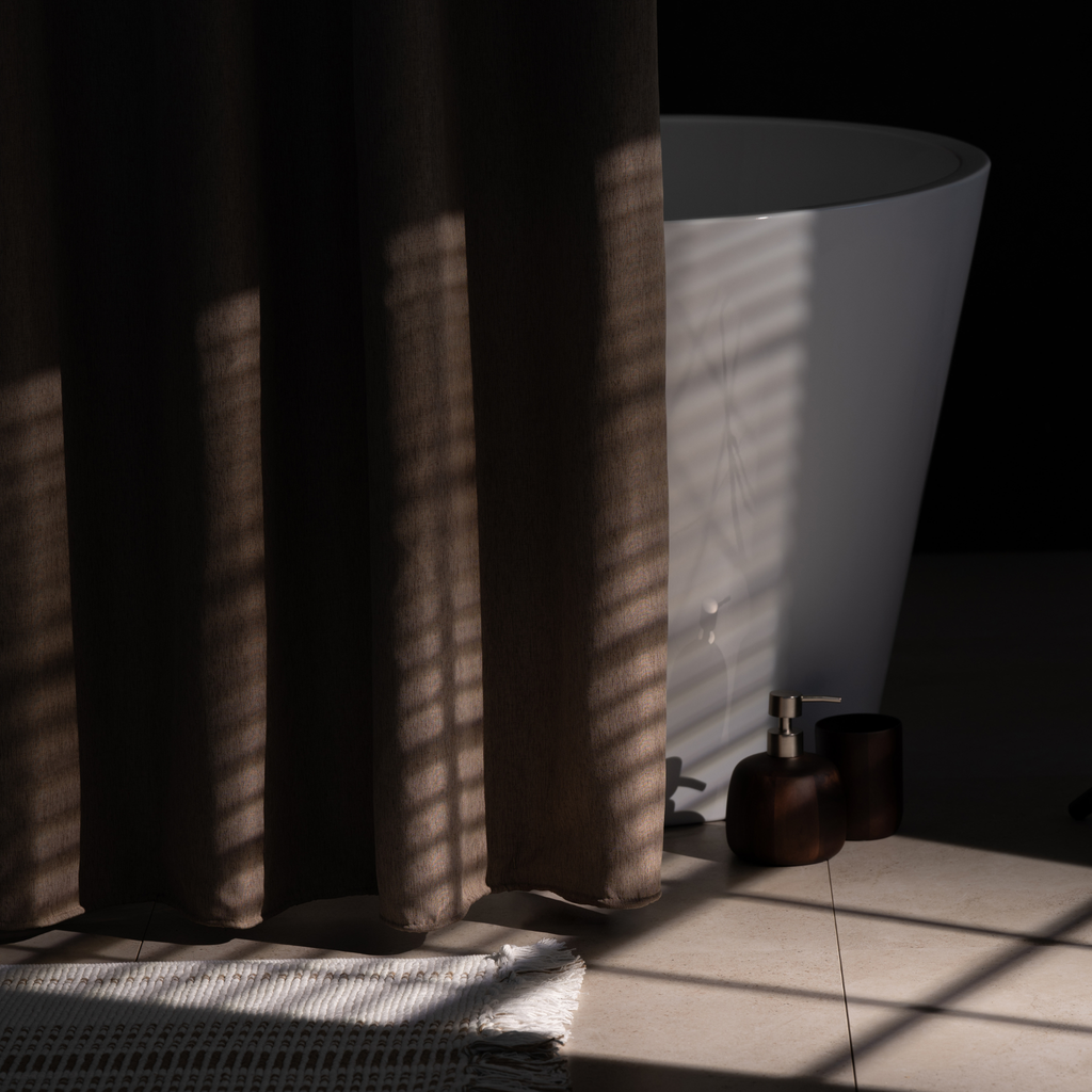 Side view of the greige panel showing its soft heavy textile drape