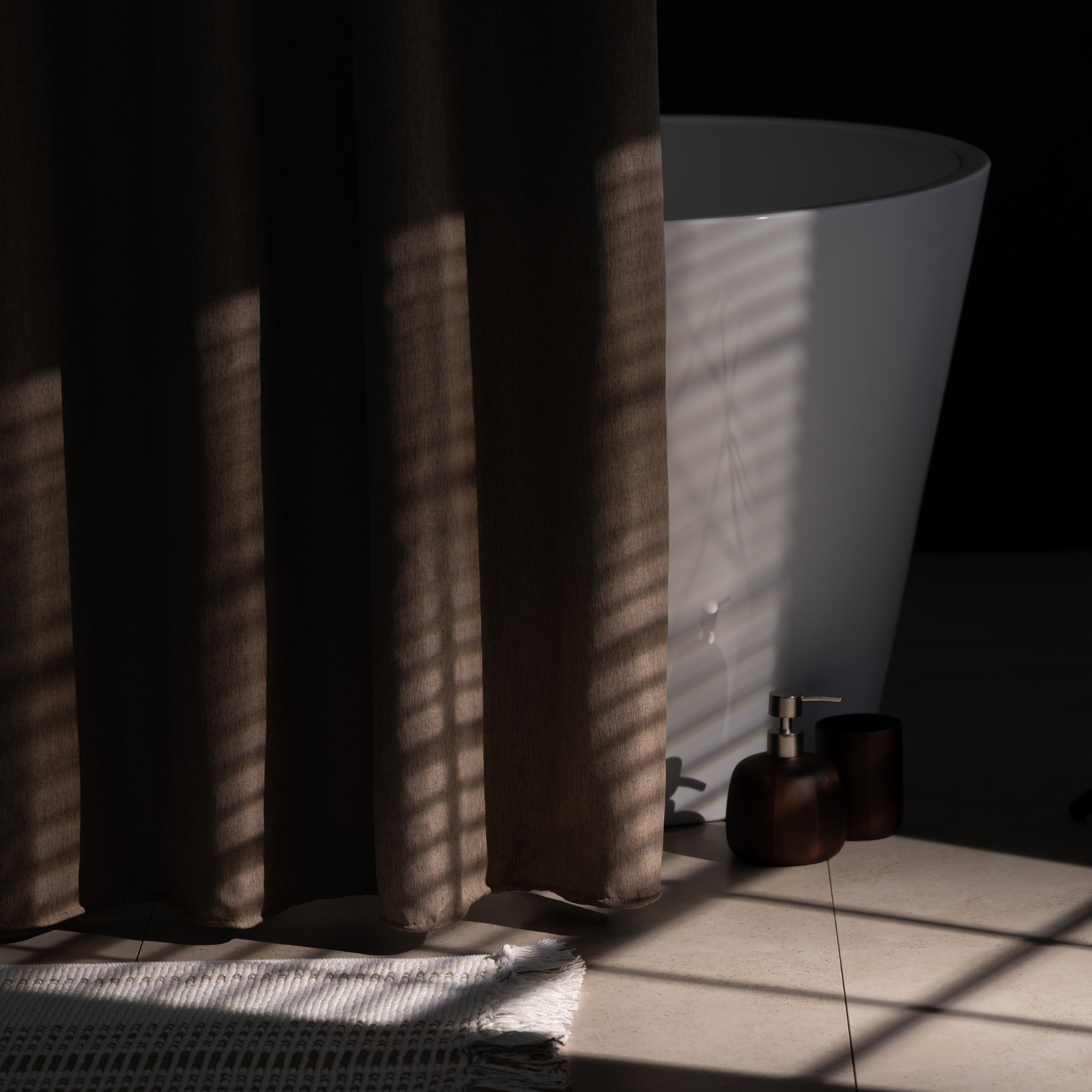 Side view of the greige panel showing its soft heavy textile drape