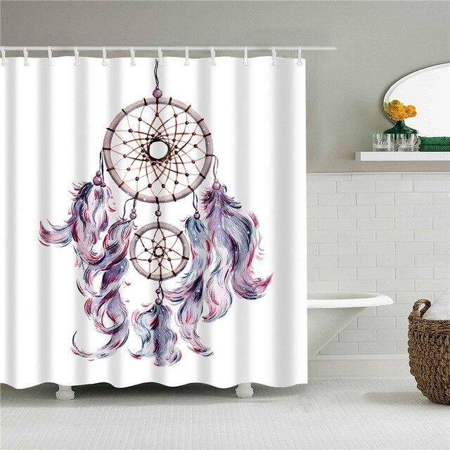 Watercolour dreamcatcher with pink and turquoise feathers drawn on a white ground