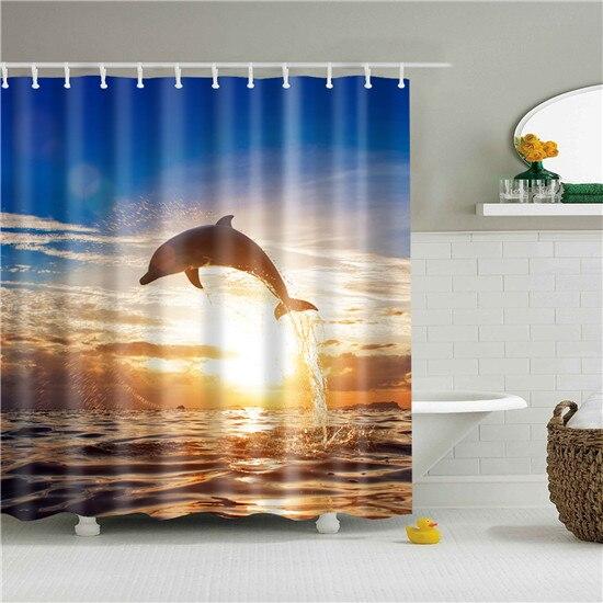 Dolphin leaping clear of the ocean at sunset with golden reflections on the waves