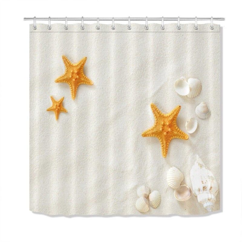 Close view of the starfish and shells on the pale sand print