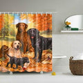 Chocolate black and sand labradors with puppies lying on orange autumn leaves