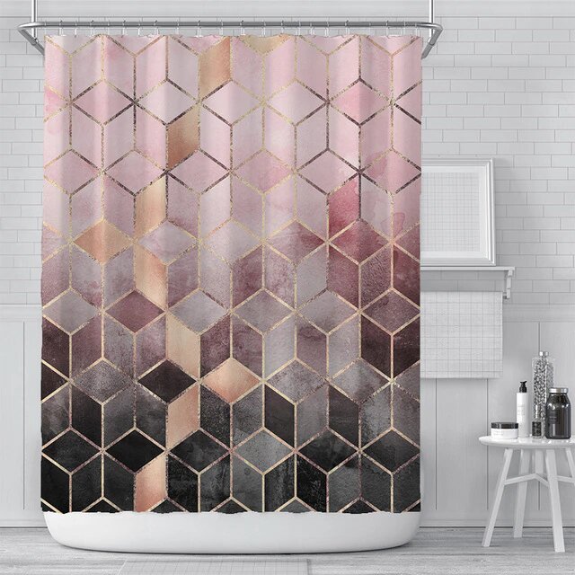 Trompe l oeil cubes fading from blush to charcoal with gold lined edges