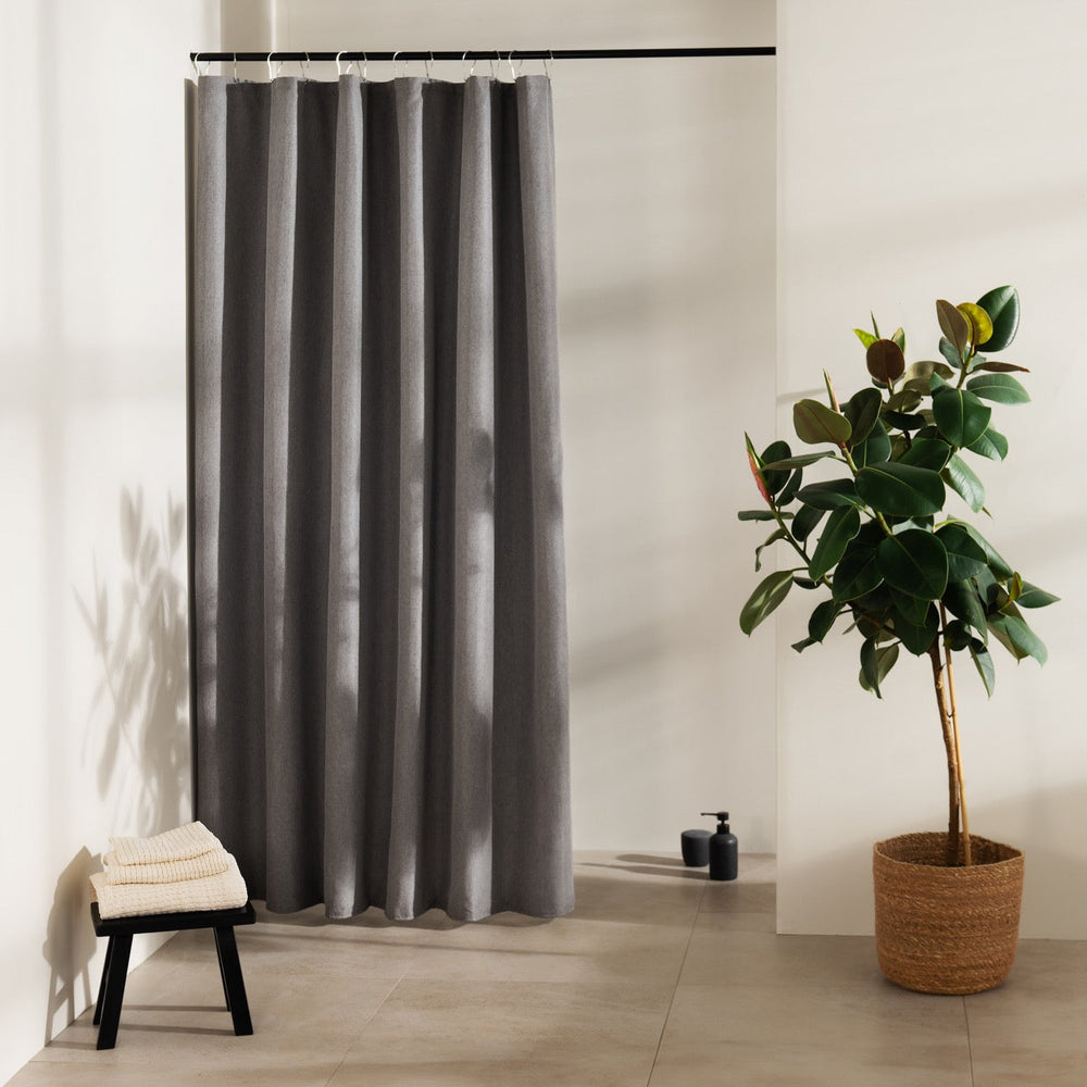 Strictly unprinted mid grey panel with even vertical folds