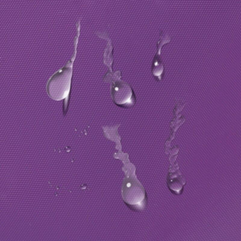 Close view of the woven texture on plain purple fabric