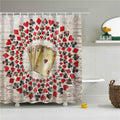 Red and black playing cards fanned in a rosette over faded grey wood planks