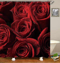 Deep red roses filling the frame in close up with dew on the petals