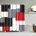 Bold rectangles of red, grey, white and black in an asymmetric grid