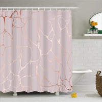Copper and rose gold marble veining running over an even powder pink ground