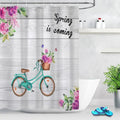 Turquoise vintage bicycle with fuchsia peonies on faded grey wood planks