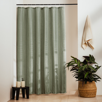 Plain sage green panel with a woven texture and tone on tone stripes