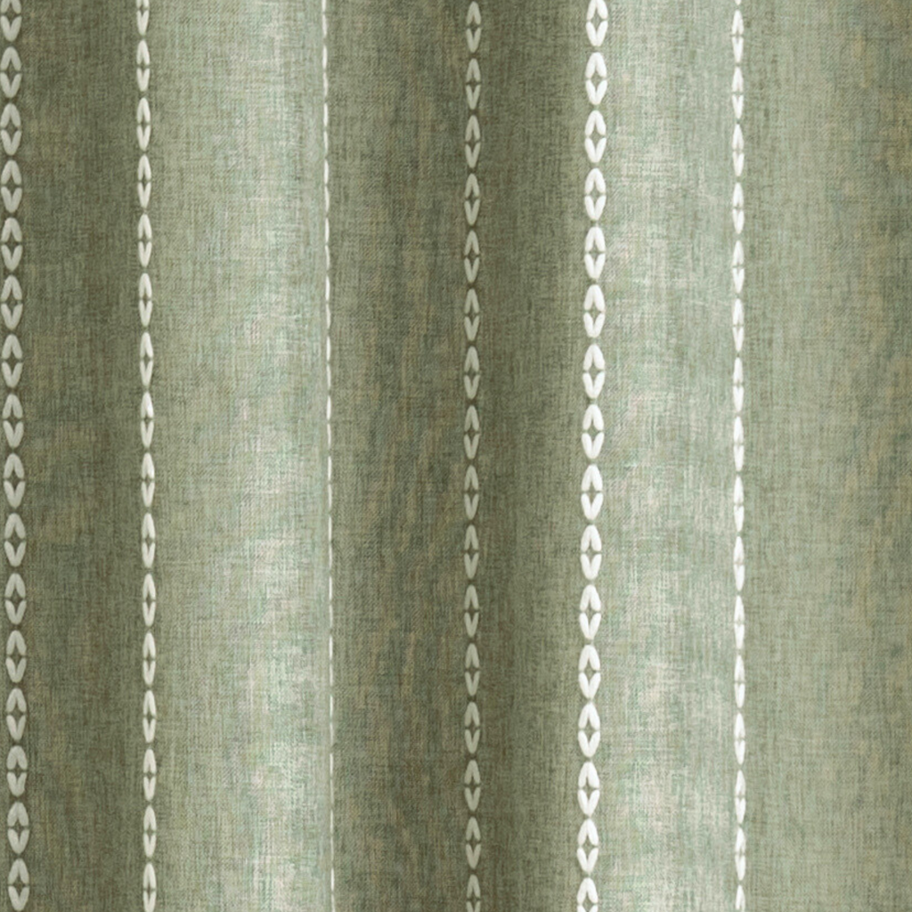 Weighted lower hem holding the sage panel in an even straight fall