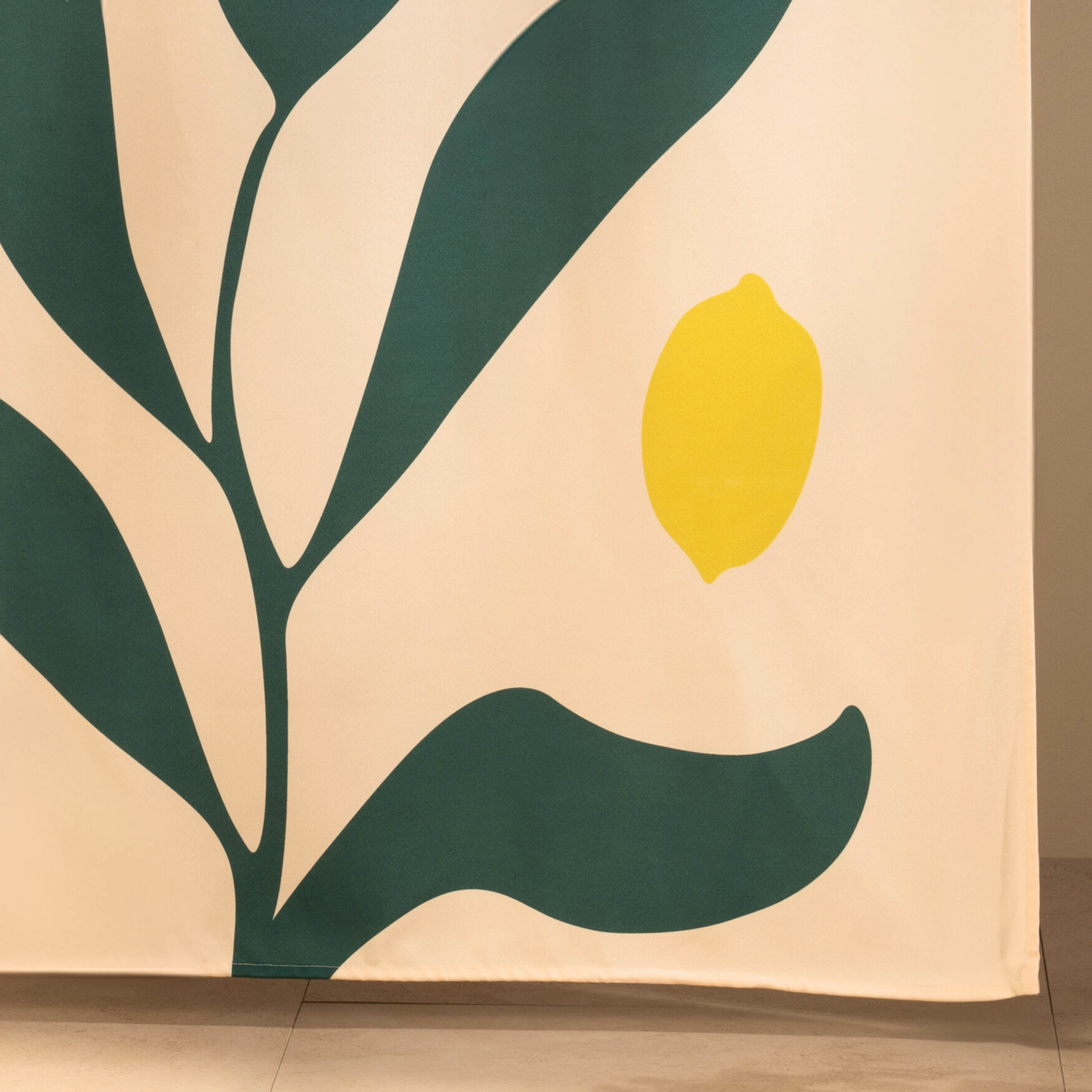 Full length lemon curtain hanging beside a glass shower screen