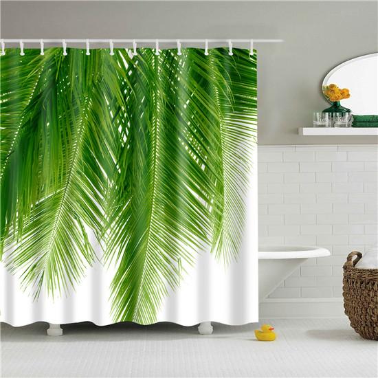 Green palm fronds trailing down from the top against a pure white background