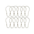 Twelve satin silver pear shaped rings laid out in two rows of six